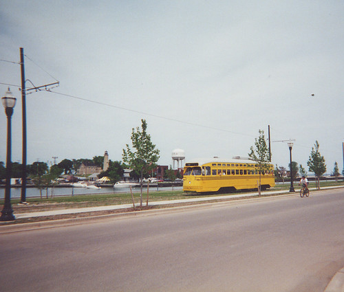 Westbound Kenosha Wisconsin yellow streetcar running alongside the harbor on 54th Street. Kenosha Wisconsin, Opening day. Saturday, June 17th 2000. by Eddie from Chicago