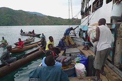 Canoes from Ruarwe meeting the MV Ilala