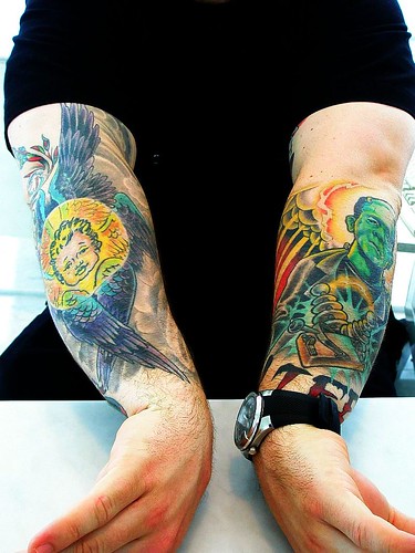 Angel and Monster Arm Sleeve Tattoos