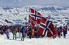 A group of Norwgians wave flags and show their pride at Finse, Norway