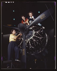 Women at work on C-47 Douglas cargo transport,...