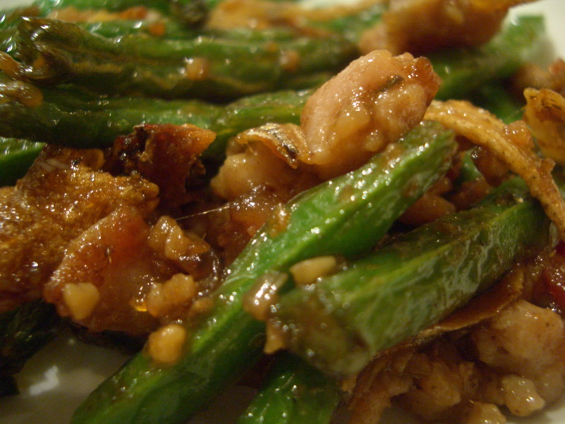 Pork and beans with whitebait (closeup)