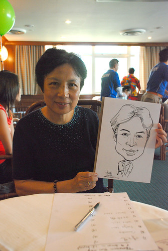 Caricature live sketching Temasek Fun Day 1