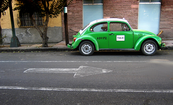 Green Volkswagen Beetle Taxi
