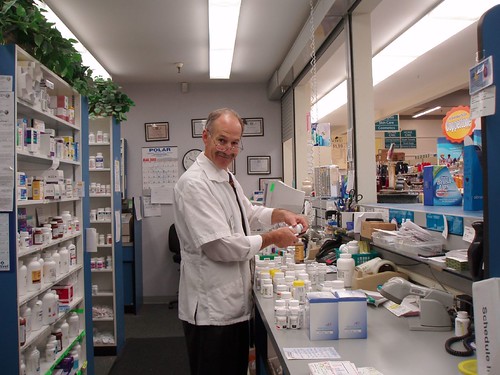 Jim Depuy, pharmacist checking in order