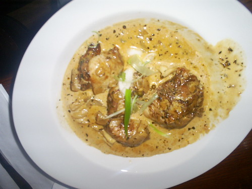 Jerck Chicken avec creme rhum sauce w/ oyster mushrooms