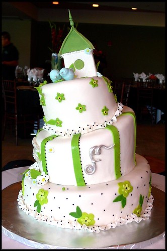 Love Birds Wedding Cake Whimsical cake features a sugar sculptured bird 