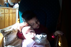 Luke and Talia in the rocking chair