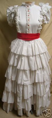 My dress as found, need to take off red buttons and re-work sash and add buckle.  Lace needed on ruffles and a few other spruce ups.