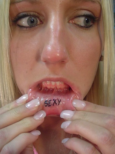 strange mouth tattoo