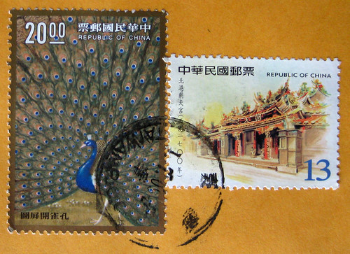 Chinese stamps + peacock