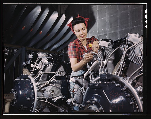 Woman working on an airplane motor at North American Aviation, Inc., plant in Calif. (LOC)