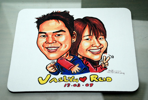 couple caricatures on mousepad 260408