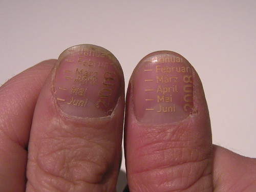 A Calendar Laser Etched Into Fingernails