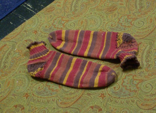 Finished pair of red and brown striped socks
