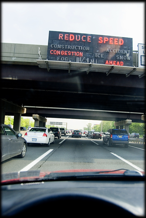 reduce-speed-sign