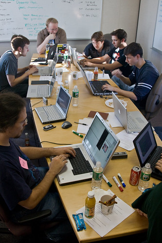 geeks working around the table on their start-up