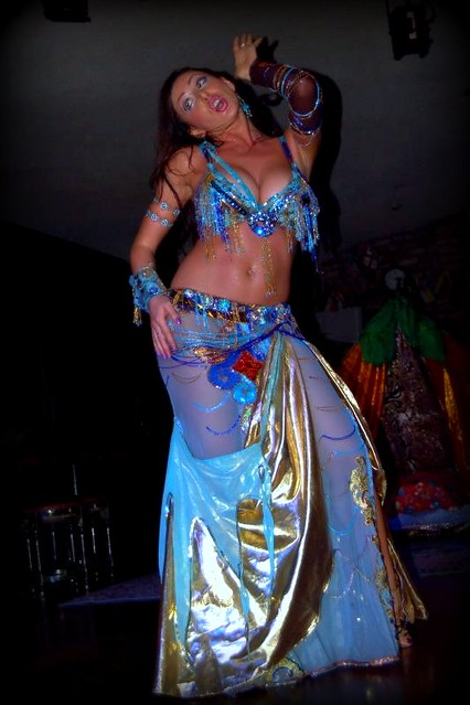 Belly dancer in blue performs at Istanbul dinner club