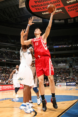 Yao Ming shoots over Antawn Jamison on Tuesday night in a 92-84 win over the Washington Wizards.  Yao scored 21 points and Luther Head added 24 to help the Rockets win their third straight game.