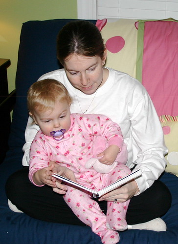 Heather reading to Anna before bed