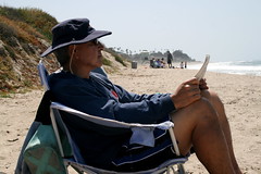 Rudy reading on the beach at San Clemente