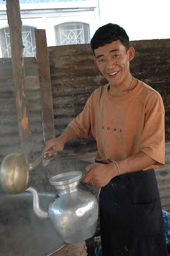 Tea Master Tharlam Monastery outdoor temporary kitchen Bodha Kathmandu Nepal by Wonderlane