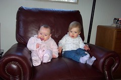Anna and Talia sitting on the recliner