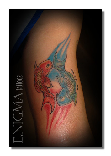 Pisces Designs Tattoo Red and Blue on arm