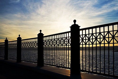 Riverfront Fence At Sunrise