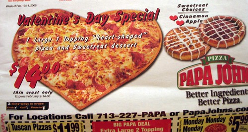 pizza pizza ad. a heart-shaped pizza: