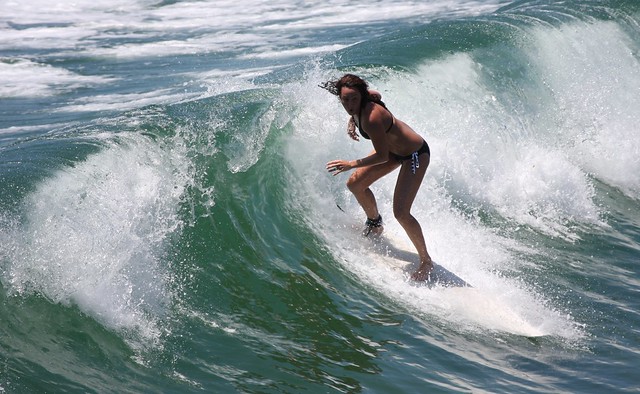 surfing girls wallpaper. Surfer Girl riding a wave
