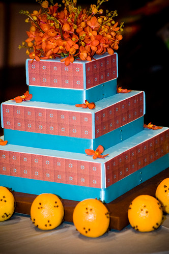 Check out this gorgeous turquoise and orange wedding cake from a wedding in
