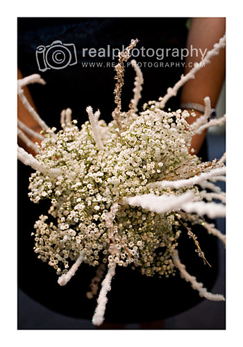Winter wedding bouquet with babies breath fluff and glitter