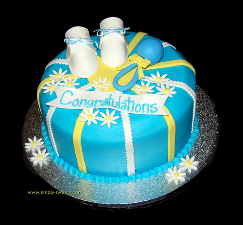 Baby Boy shower cake with rattle and booties