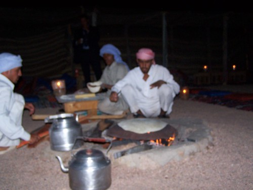 The Bedouin men cooking