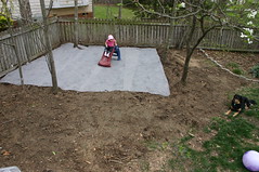 Anna on her new playplace, before it gets mulch