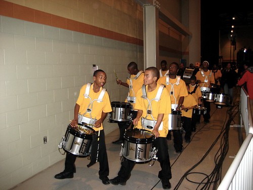 A kids' marching band leaves the Obama victory rally