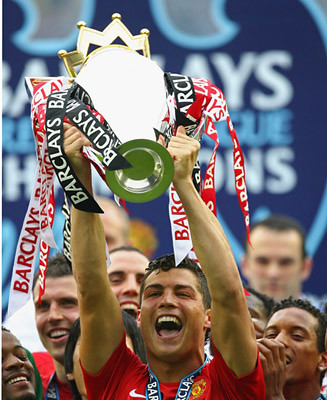 Cristiano Ronaldo lifts the Barclays Premier League Trophy