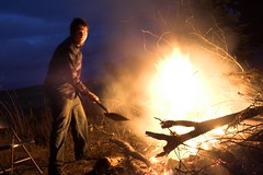 Tim playing in the fire.