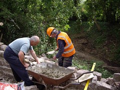 Volunteers at work rebuilding the parapet wall of the Wood Lane bridge