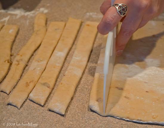 cutting onion cheddar breadsticks