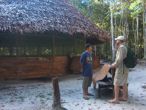 Julio & Martin evaluates every hut in the village
