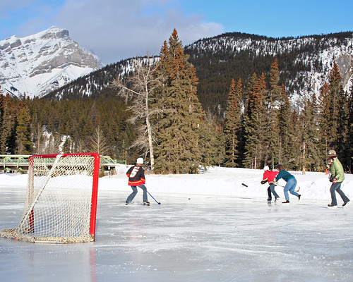 Pond Hockey at the Fairmont Banff Springs by Banff Lake Louise