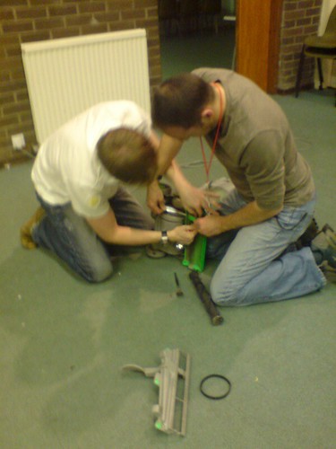 How many men does it take to fix a vacuum cleaner?