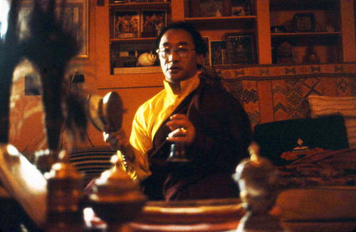 His Holiness Jigdal Dagchen Sakya doing pujas (prayers) with a bell and drum - Seattle  Sakya Lhakang 1976, Washington State, USA by Wonderlane