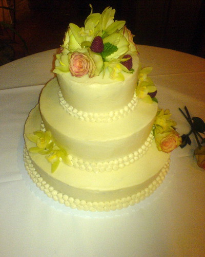 Inside this simple white threetiered wedding cake was a moist dark 