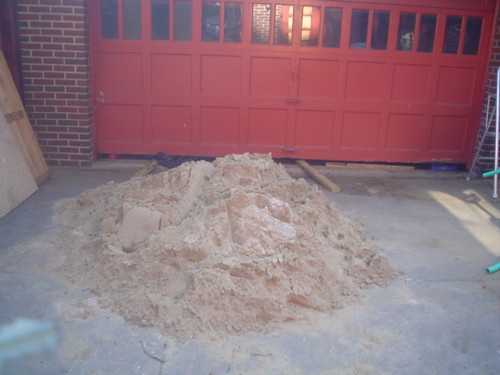Sand pile by garage