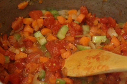Add diced tomatoes and dried herbs