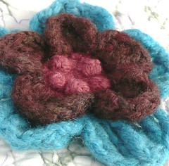 blue and brown crochet flower