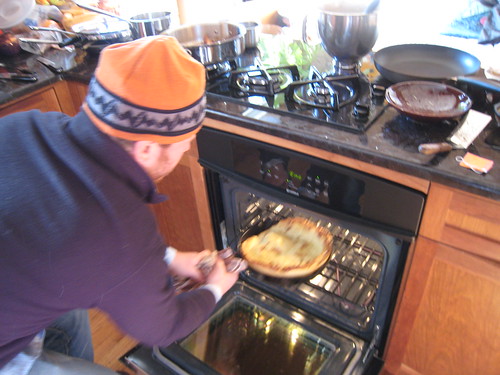 Michael came over and made baked pancakes that were spectacular - Pulling the pancake from the oven